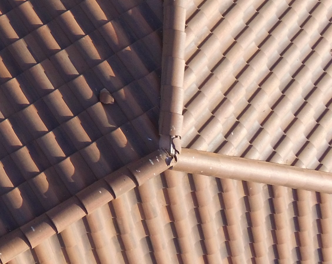 Drone photo of damaged roof tiles
