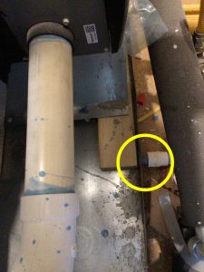 Photo from Texan Inspection home inspector finding Condensate Pan is Blocked.