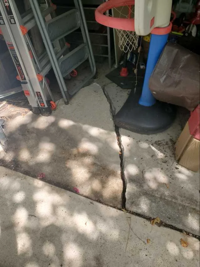 Home Inspector Cracking Garage Foundation